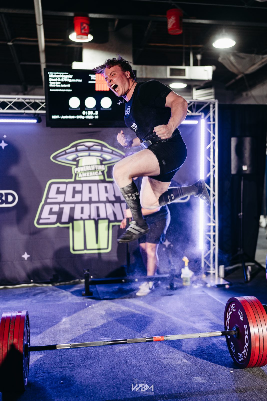 Lifter leaping after a big attempt at Scary Strong